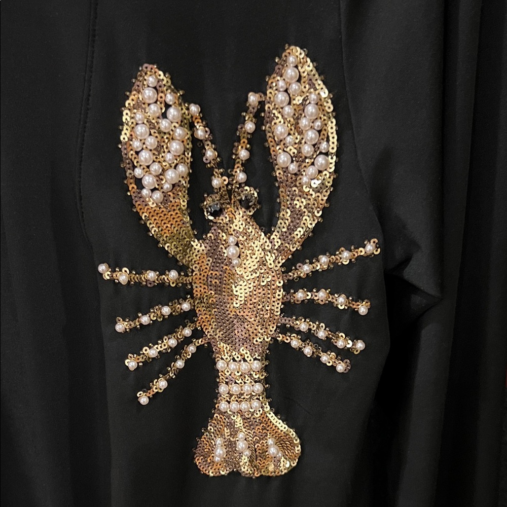 Elegant Black Top with Gold Lobster Design
